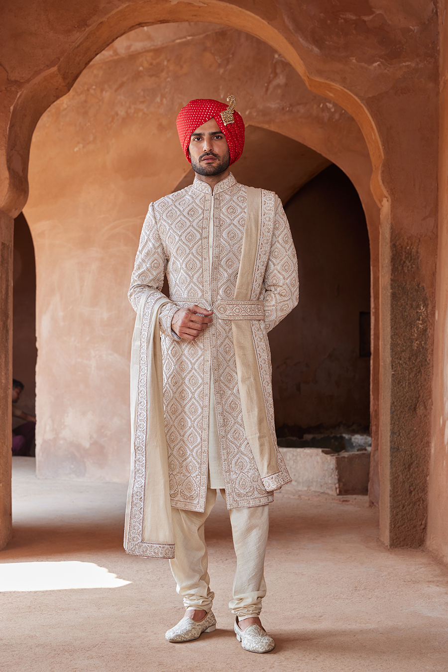 IVORY RAW SILK SHERWANI WITH KURTA CHURIDAR AND OPTIONAL STOLE BELT AND EMBROIDERED JUITS