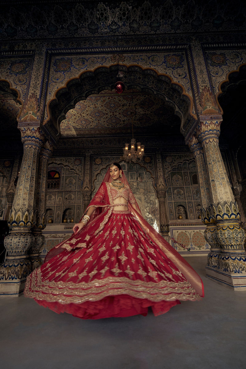 RED RAW SILK LEHENGA CHOLI SET WITH A HEAVY NET DUPATTA